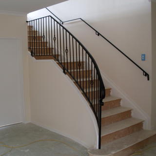 Curved wrought iron balustrade