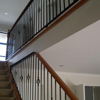 Wrought iron with rimu handrail