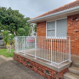 White balustrade with design every fourth
